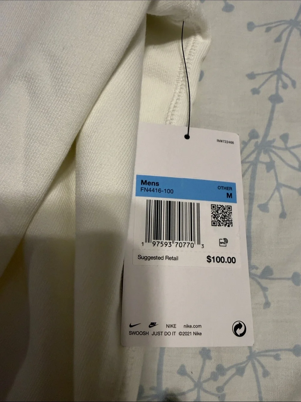 Nike White Hoodie with Red Smiley Stripes and Blue Accents